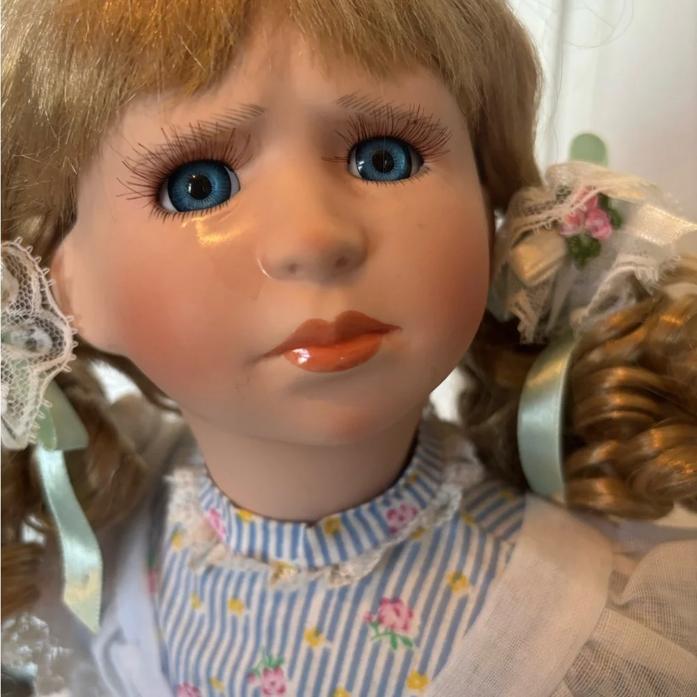 Charming Blue and White Porcelain Doll with Curly Hair - Picture 2 of 11